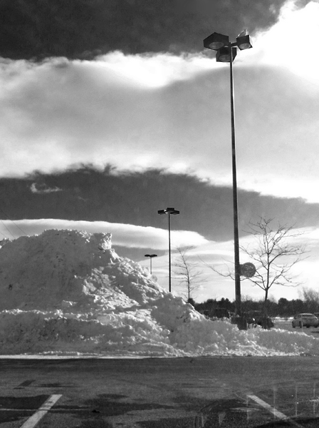 Mountains-of-snow-in-parking-lots-in-South-Portland,-Maine